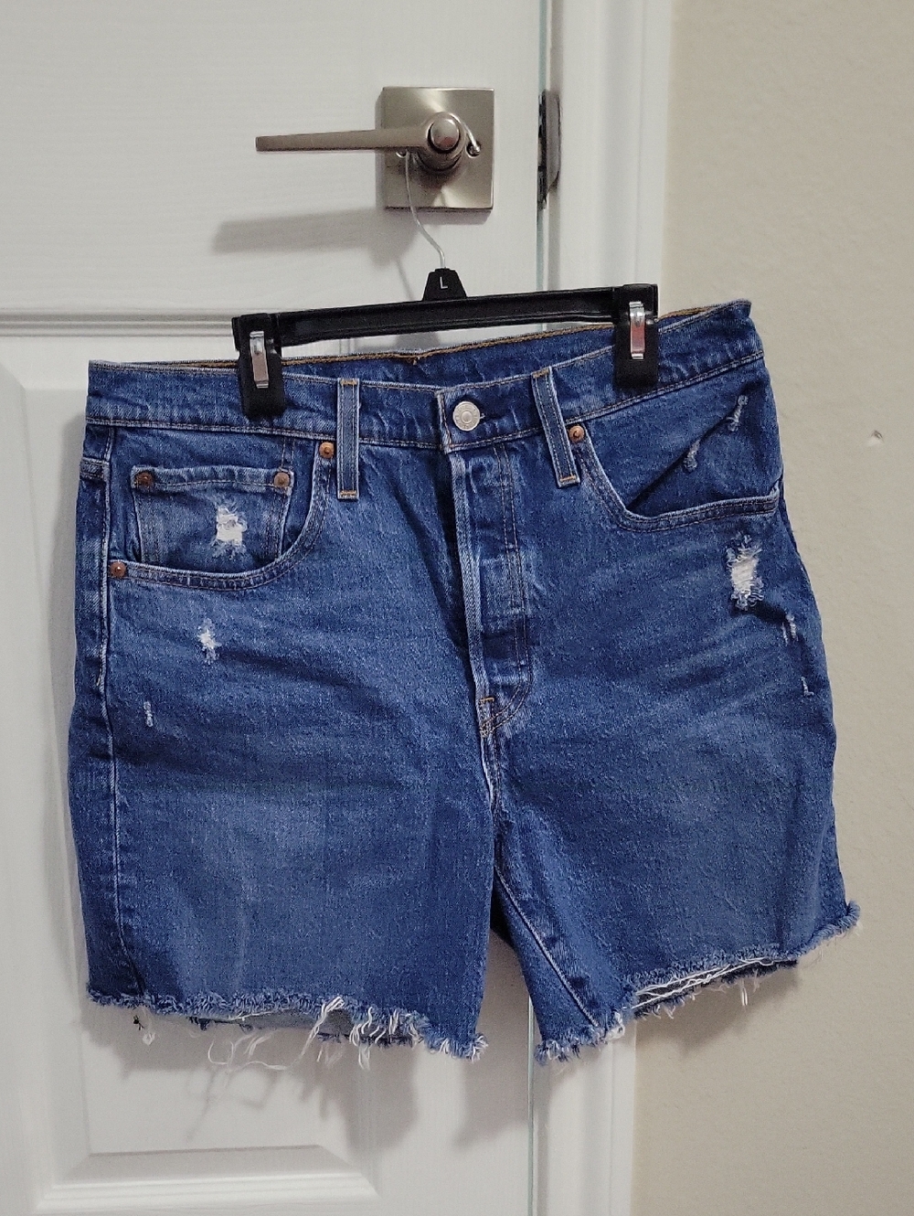 Levi's Distressed Dark Blue Denim Cutoff Shorts